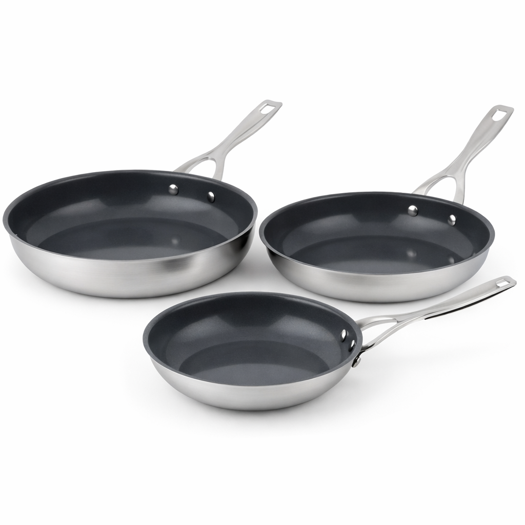 Three frying pans with non-stick surfaces on a white background