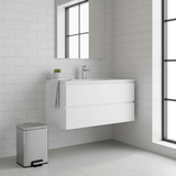 Stainless steel dustbin in bathroom